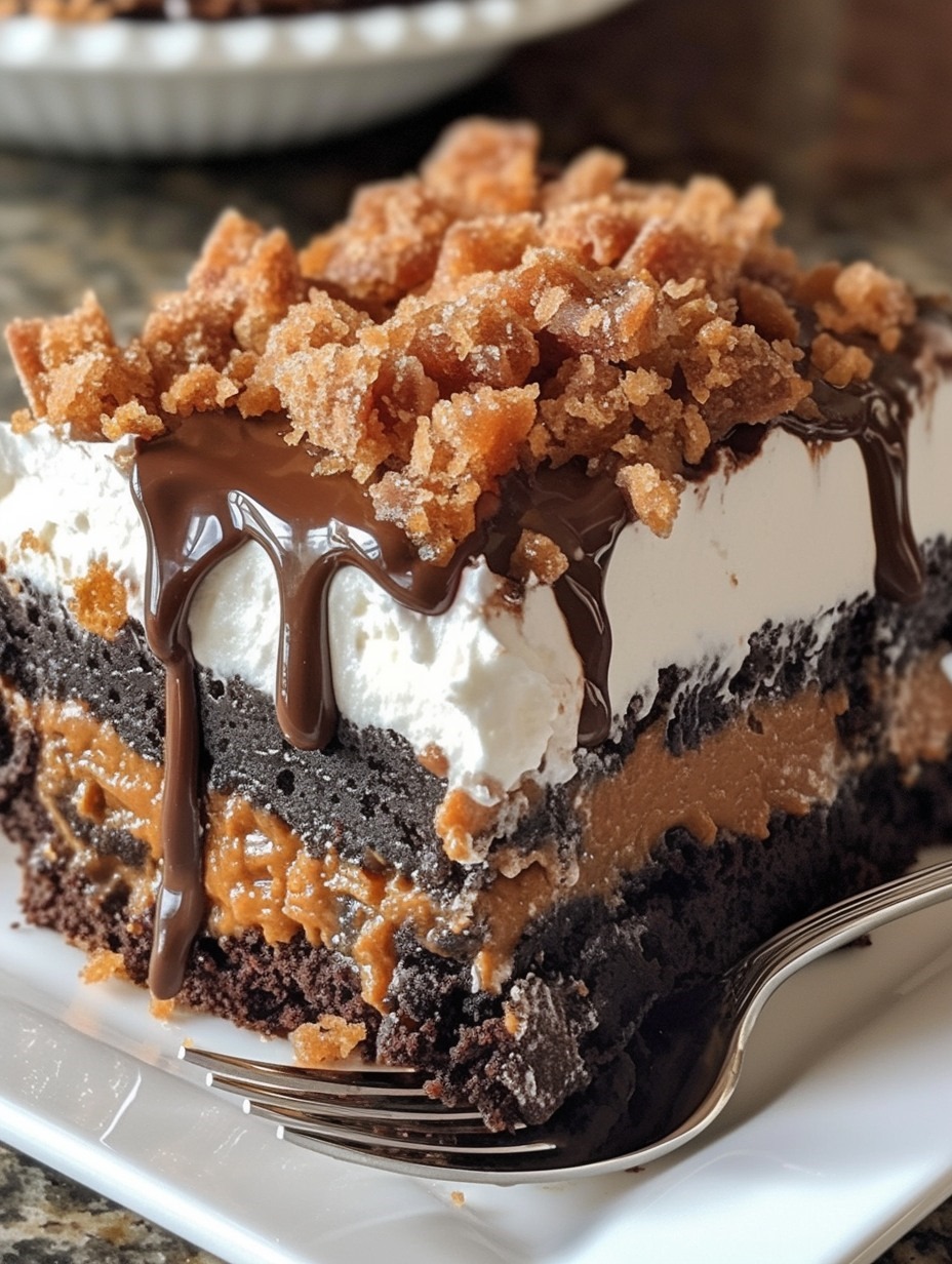 Butterfinger Candy Bar Poke Cake Recipe