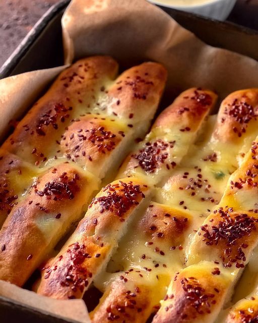 these irresistible Homemade Cheesy Garlic Breadsticks!