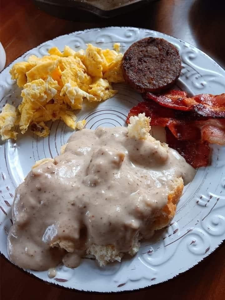 Homemade biscuits and gravy, eggs and bacon