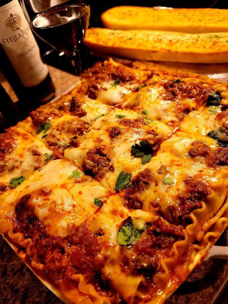 Homemade Four Cheese Lasagna With Italian Sausage And Beef