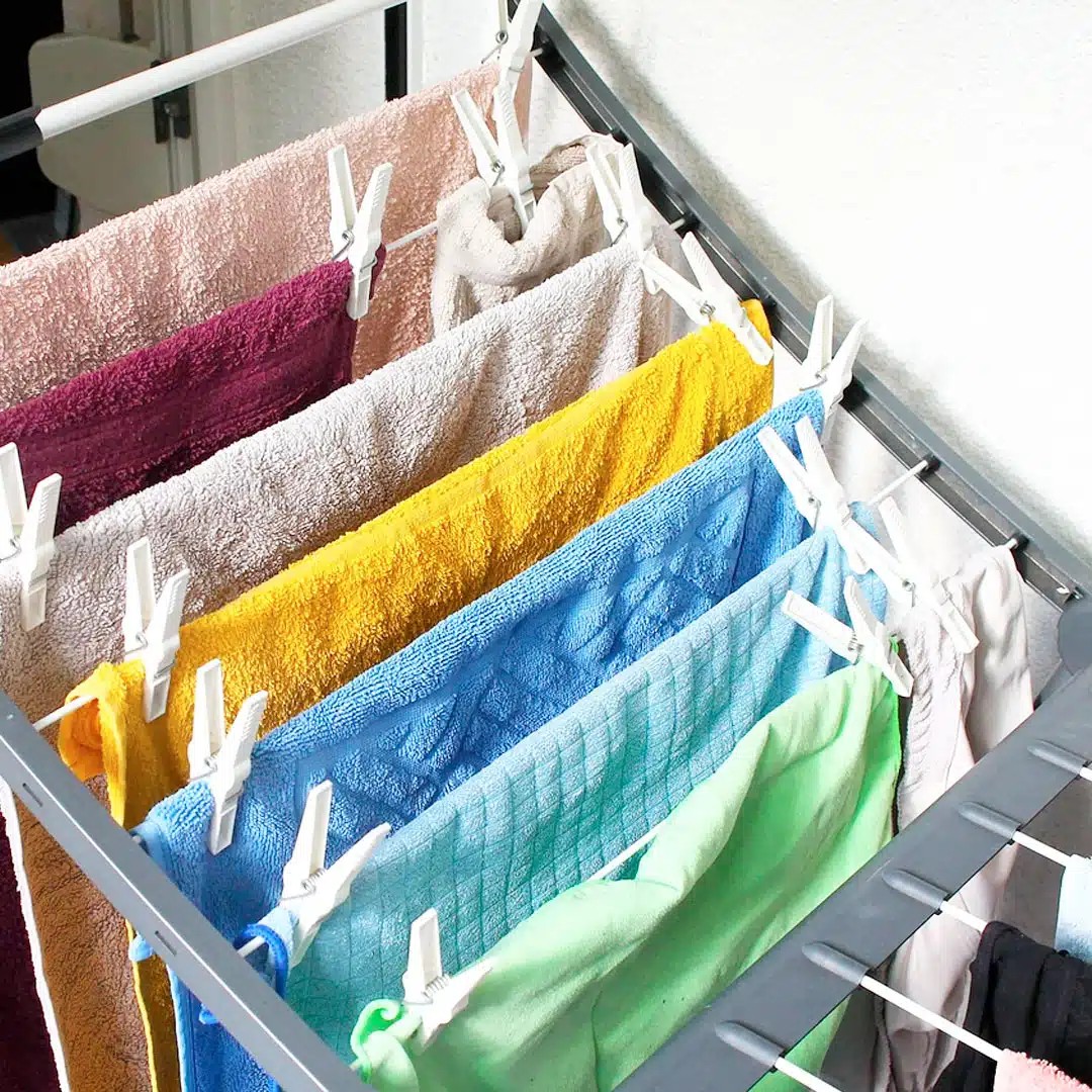 Why should you avoid drying laundry indoors?